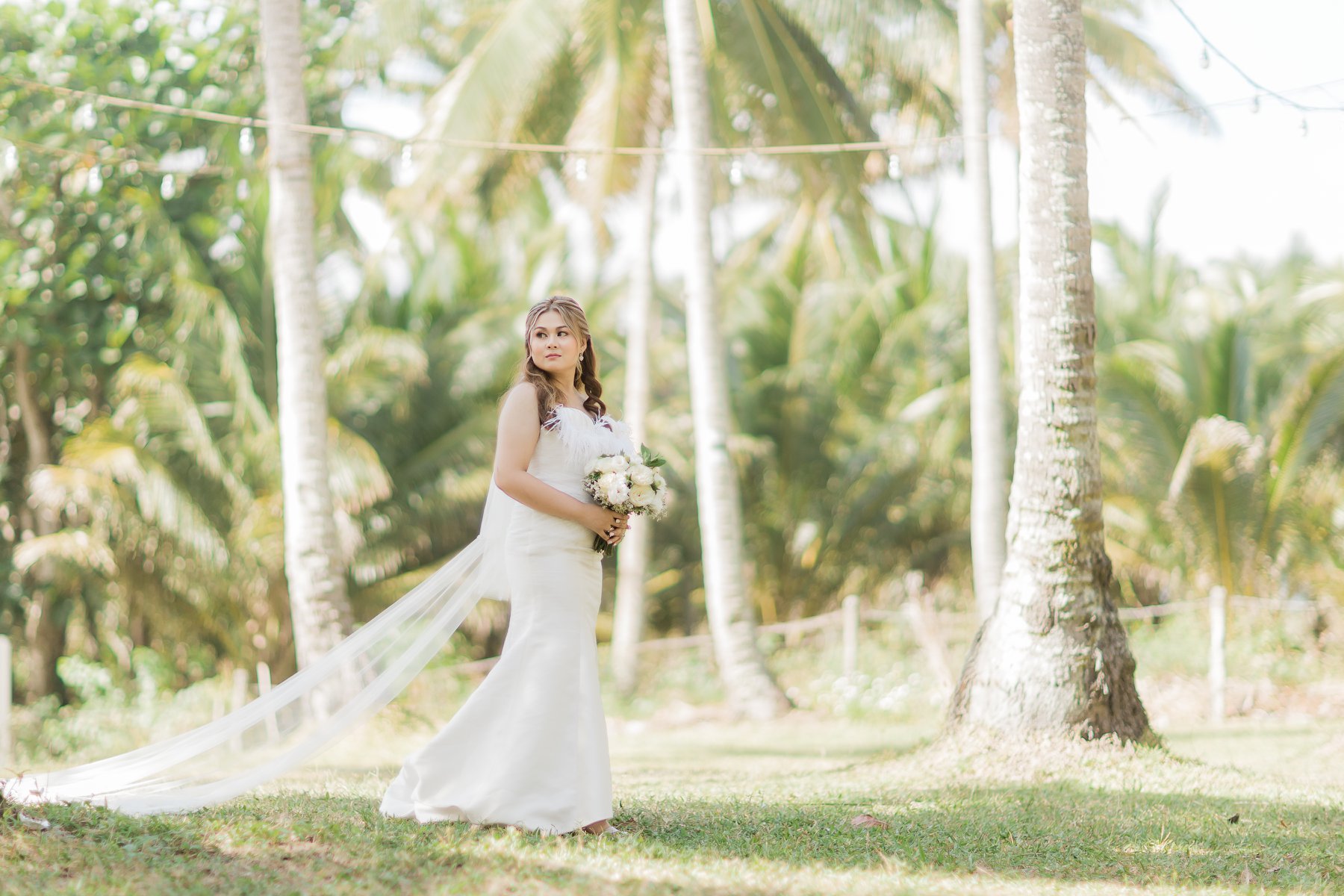 Bride showing off her gown