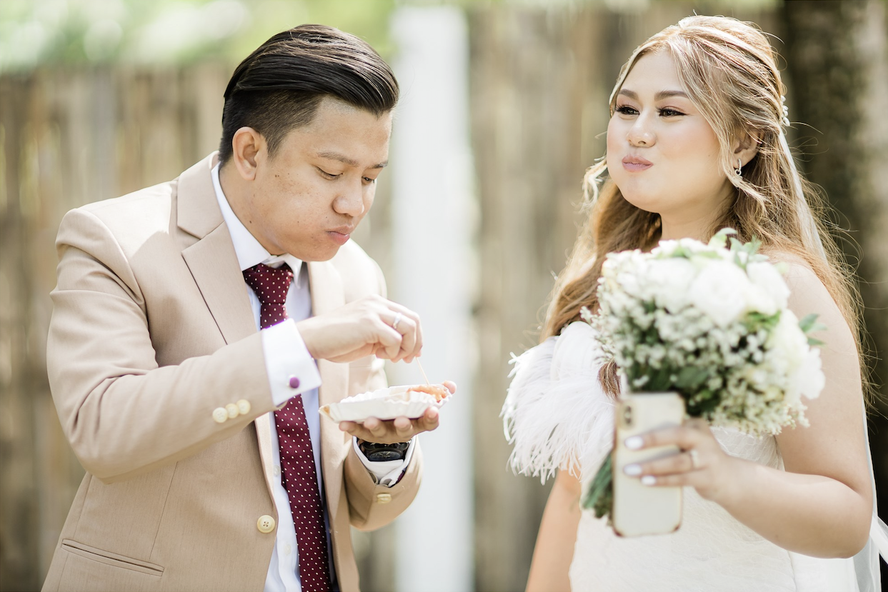 Couple eating during wedding reception
