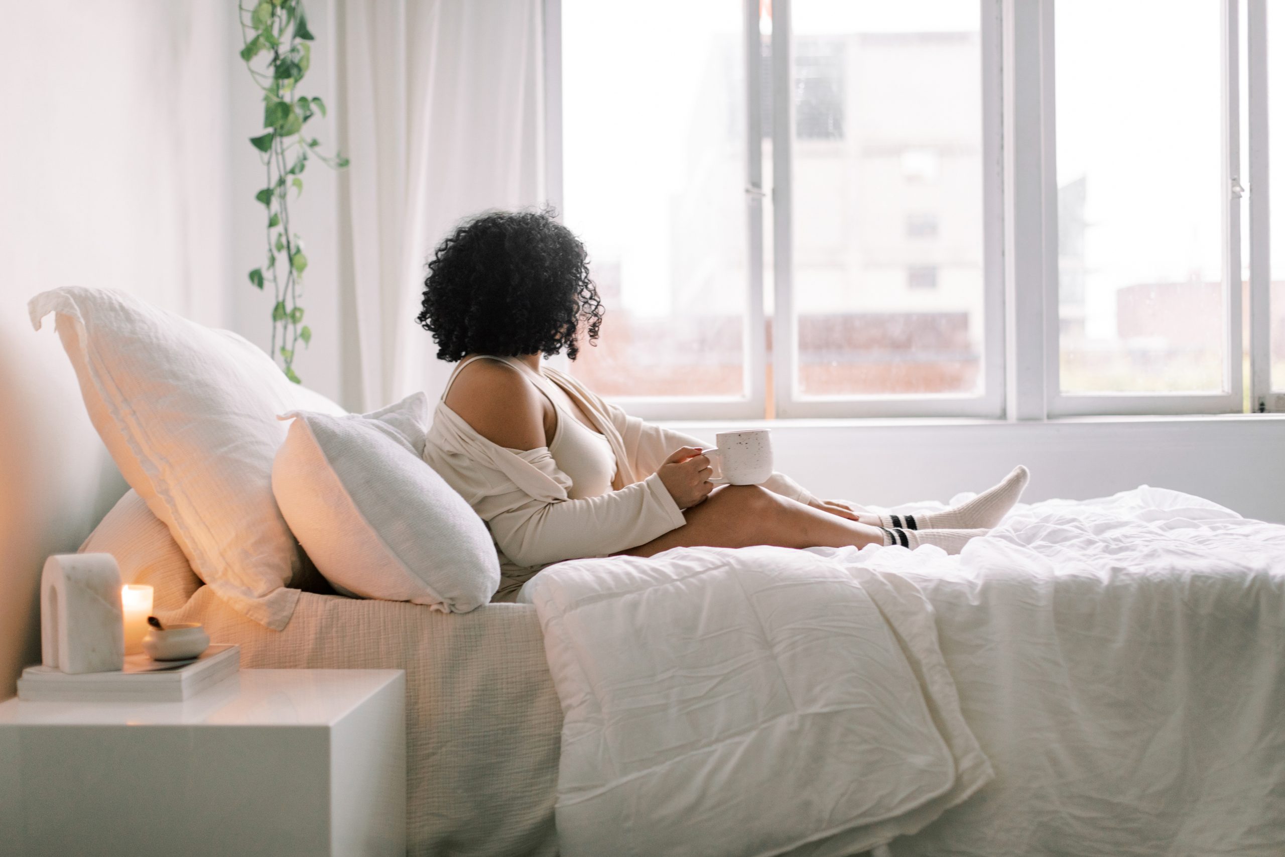 woman resting in bedroom